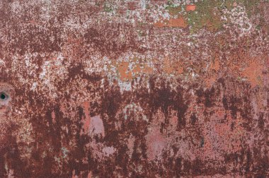 Soyut metal doku arka planı. Paslı eski yüzey ve kırmızı çamurlu