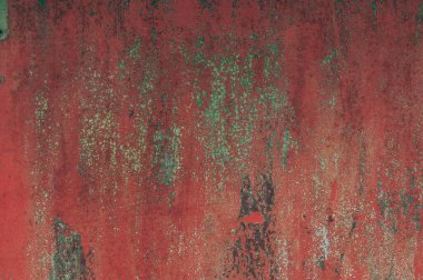 Soyut metal doku arka planı. Paslı eski yüzey ve kırmızı çamurlu