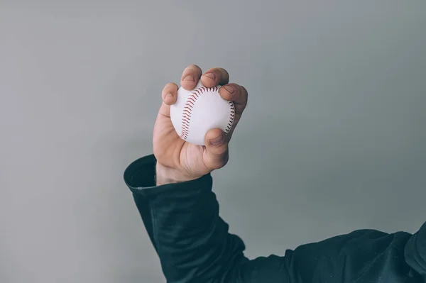 Guy Holds Baseball Ball His Hand Gray Background — Stock Photo, Image