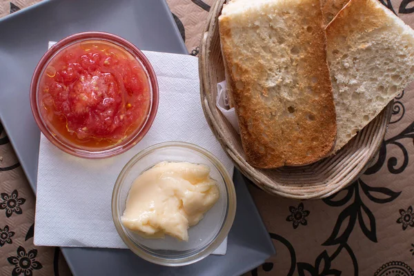 bread toasts with tomato and garlic sauce