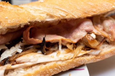 bacon cheese caramelized onions and chicken breast baguette sandwich clipart