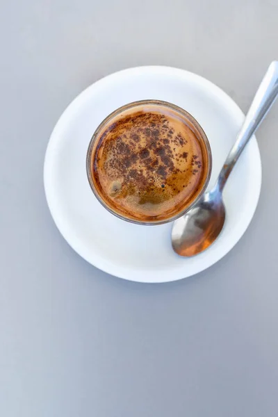 coffee with burned alcohol and powdered cinnamon