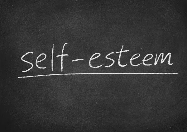 self esteem concept word on a blackboard background