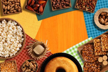 Festa Junina 'nın yiyecek grubu tipik bir Brezilya partisi sarı arka plan ve üst manzara üzerine.