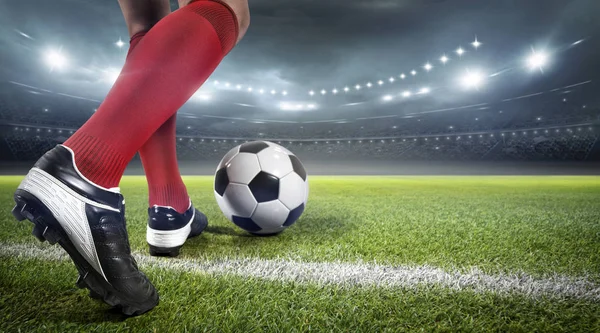 Top futbol oyuncusu. Hayali futbol stadyumu modellenmiş ve render.