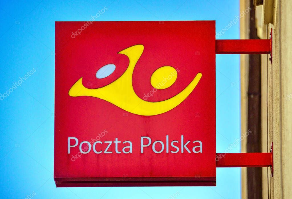 WARSAW, POLAND, April 06 2018: Poland post office logo on sign hanged on the building wall in Warsaw, Poland.