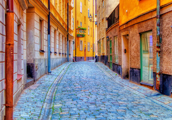 STOCKHOLM, SWEDEN, September 16 2019: Empty street inside Old Town known under Swedish name as Gamla Stan in Stockholm, Sweden.