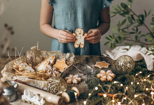 Children Hands Hold Gingerbread Man Table Spruce Branch Other Christmas — Stock Photo, Image