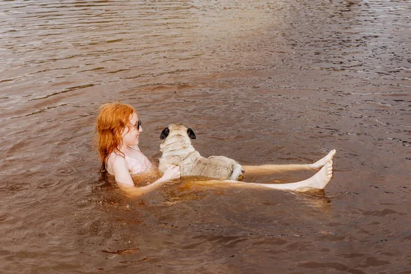 Red Haired Girl Teaches Her Pug Swim River — Stock Photo, Image