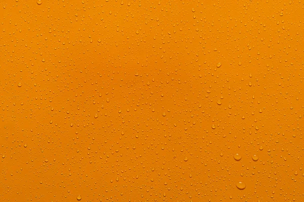 Nahaufnahme Wassertropfen Orange Hintergrund — Stockfoto