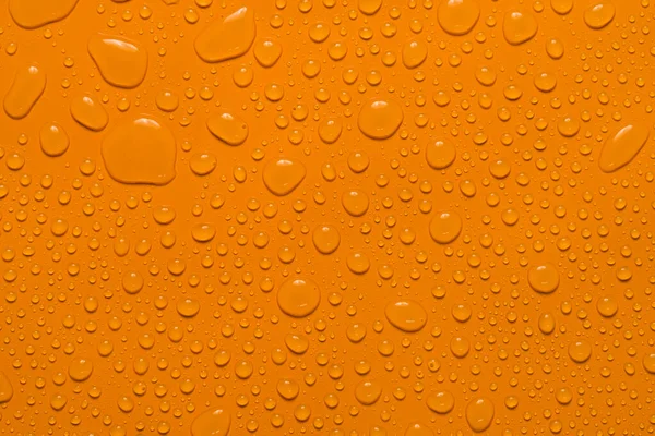 Primer Plano Gota Agua Fondo Naranja — Foto de Stock