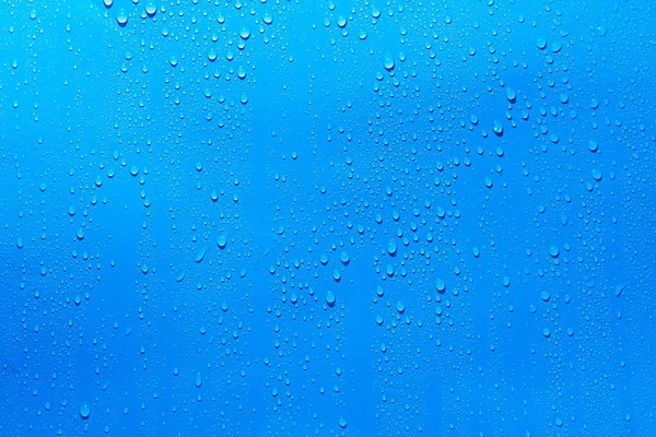 Gotita Agua Sobre Fondo Azul — Foto de Stock