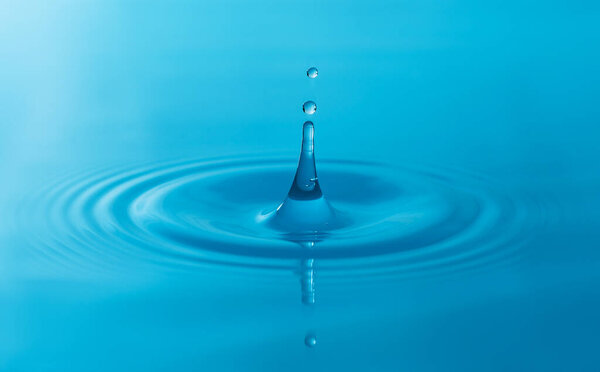 Close-up water drops isolated on white background.