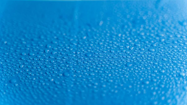 Close Depth Field Water Drops Blue Background — Stock Photo, Image