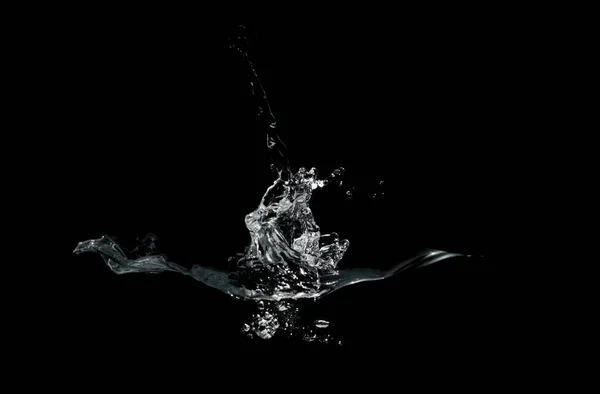 Zblízka Vody Stříkající Bubliny Izolované Černém Pozadí — Stock fotografie