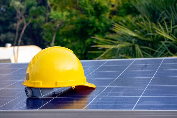 helmet Safety on Solar panel with nature background concept