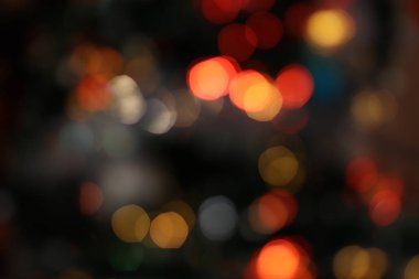 Bokeh arka plan. Renkli. Defocused. Bulanık soyut parlak ışıklar. Tatil zamanı. Akşam