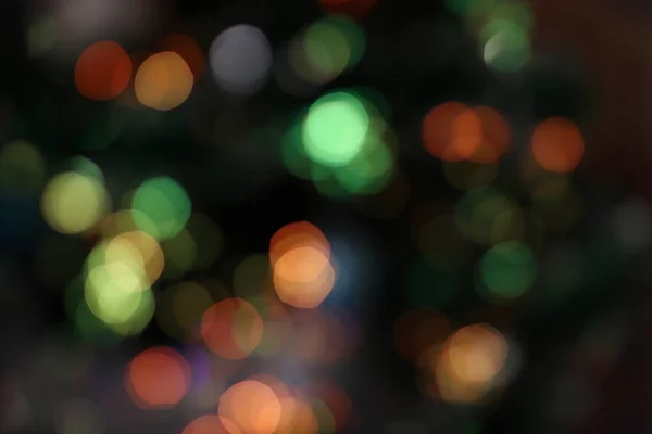 Bokeh arka plan. Renkli. Defocused. Bulanık soyut parlak ışıklar. Tatil zamanı. Akşam