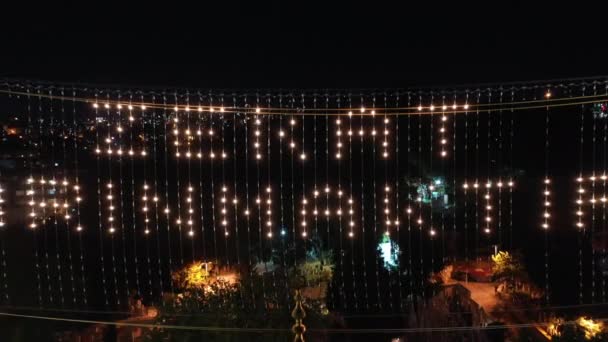 Aerial night view of Eyup Sultan Mosque. There says "Alms is purified." — Stock Video