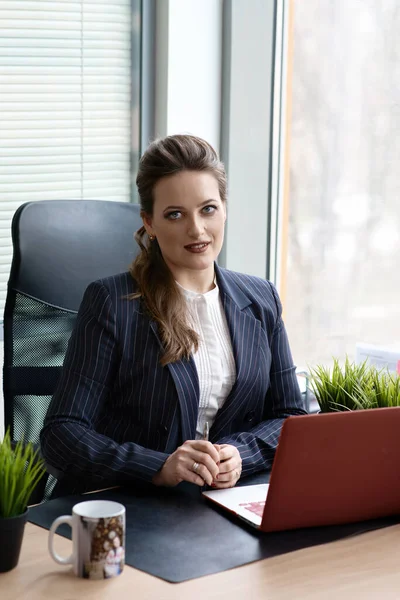 Business woman dressed in elegant style