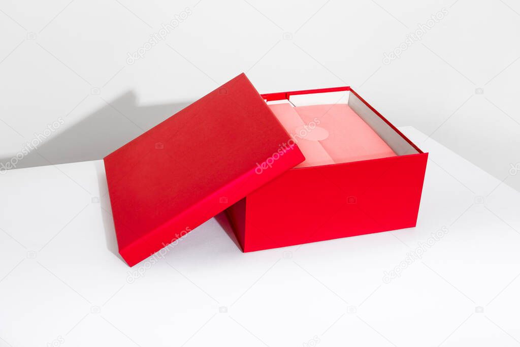 Red box for gifts and presents on white background