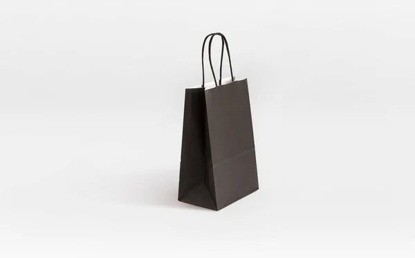 黒い小さな紙袋の買い物客 — ストック写真