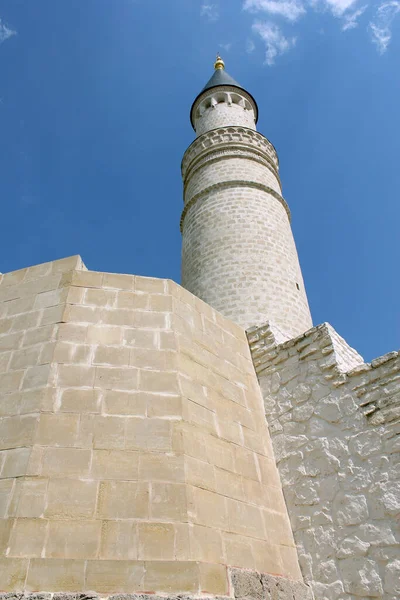 Old muslim stone mosque. Old tower in Bulgar city.