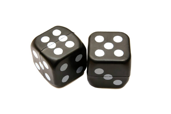 old black dice for board games on white background