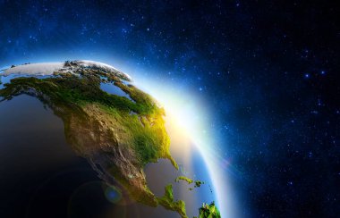 Dünya 'nın, güneşin, yıldızın ve galaksinin uzay görüntüsü. Dünya 'nın üzerinde gün doğumu, uzaydan manzara. ışık