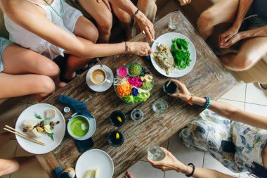 friends eat at a vegan restaurant