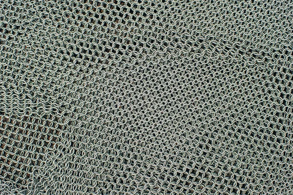 Metal chainmail ring pattern background close up — Stock Photo, Image