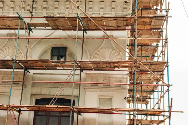 scaffolding on building facade. fall-protection safety net