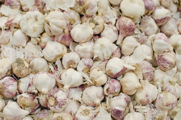 Garlic. Vegetables. Fragment from a fruit and vegetable shop