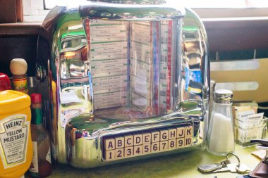 usa, utah - dec, 2019 Antique music playing device in retro style cafe, vintage jukebox, old fashion clipart