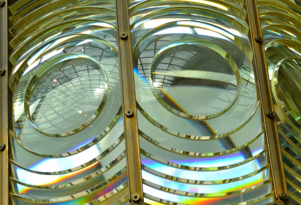 image showing the shiny glass lens on an old light house