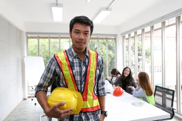 Portrait of Asian male contractor engineer in meeting room. at the office. Electricians carpenter or technical operaters and labourers or moving operators.