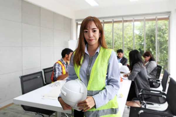 Portrait of Asian female contractor engineer in meeting room. at the office. Electricians carpenter or technical operaters and labourers or moving operators. Asian women