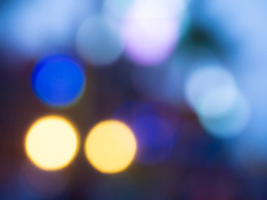 Renkli ışıkların bulanık yansımaları tarafından oluşturulan arkaplan.