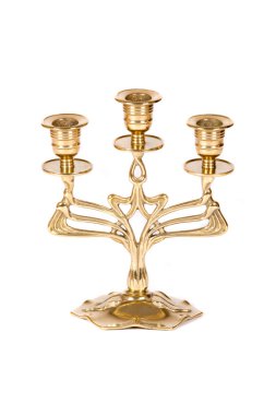 Beyaz zemin üzerine altın şamdan