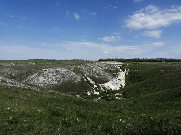 Chalky mountains in the Don River Valley. On the coast of the Don River, Cretaceous rock comes to the surface, forming small mountains. Divnogorye Museum-Reserve, Voronezh Region, 2020. Relief of the Central Russian Upland.