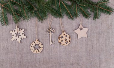 Vintage keten arka planlar üzerinde Noel süsleri