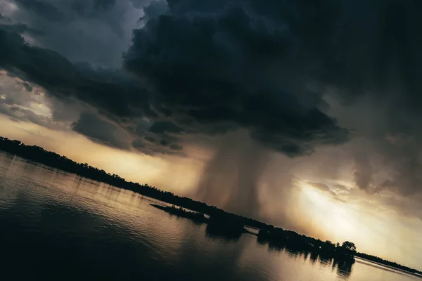 Hurricane over louisiana. Storm clouds and rain over the Mississippi