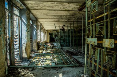  Chernobyl Exclusion Zone. Old abandoned hospital in the city of Pripyat. Consequences of the Chernobyl nuclear disaster clipart