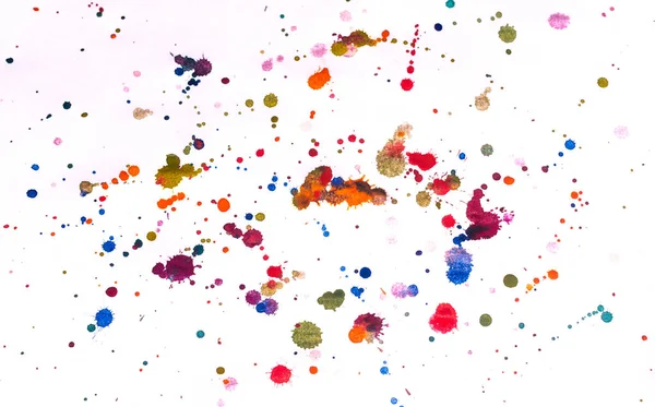 Multi-colored splashes of watercolor paints on white paper. Abstract background