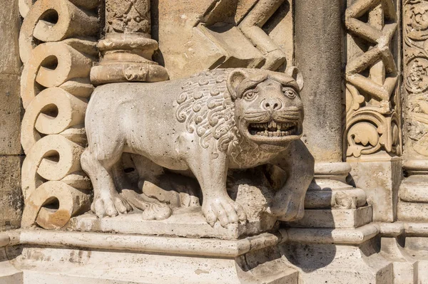 Stone gothic sculpture of a heraldic lion. Decor of an old Catholic medieval chapel