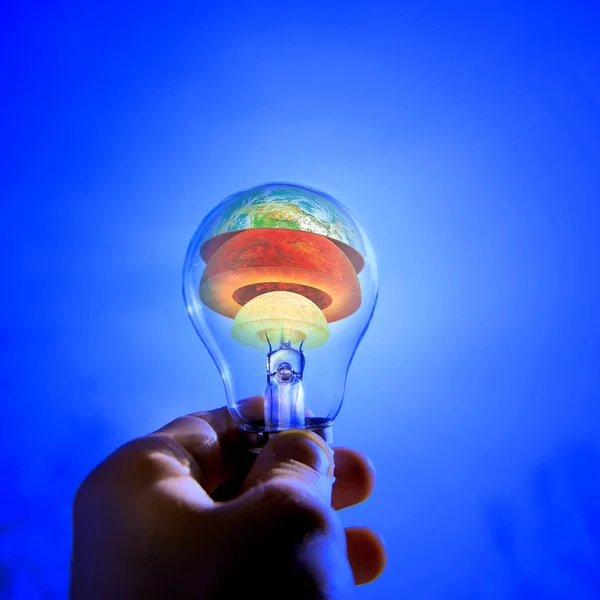 Light in the hand with the planets within. The photo taken from NASA — Stock Photo, Image