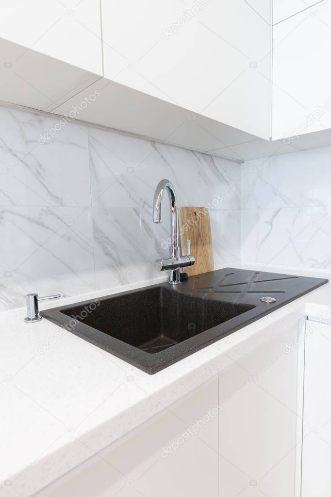 Modern minimalist sink in a kitchen room