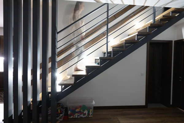 Wooden stairway in the house interior with stair light — Stock Photo, Image