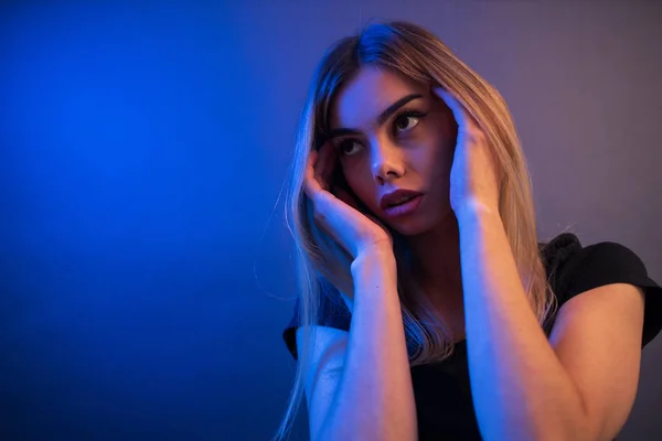 Portrait of a pretty woman having a headache after stress — Stock Photo, Image