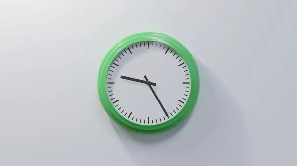 Glossy Green Clock White Wall Twenty Five Nine Time — Stock Photo, Image